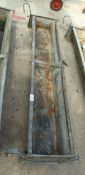A GALVANISED IRON HANG ON FEED TROUGH, 54" LONG + VAT