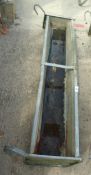A GALVANISED IRON HANG ON FEED TROUGH, 54" LONG (HOLDING WATER) + VAT