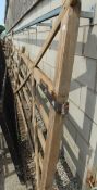 A PAIR OF 9 FT OAK GATES NO VAT