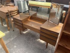 A RETRO TEAK TWIN PEDESTAL DRESSING TABLE WITH TRIPLE MIRROR AND SIX DRAWERS, 56" WIDE
