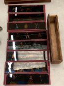 TWENTY FOUR VICTORIAN MAGIC LANTERN SLIDES DEPICTING AN ANTIQUE-STYLE TOY THEATRE WITH PUPPETS