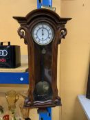 A LATE VICTORIAN AUSTRIAN VIENNESE WALL CLOCK WITH WEIGHT AND PENDULUM