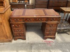 A MAHOGANY TWIN PEDESTAL DESK WITH INSET LEATHER TOP, 48" X 24"