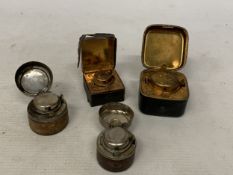FOUR VINTAGE TRAVELLING INK WELLS