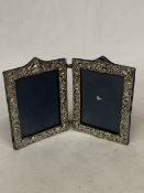 A HALLMARKED CHESTER SILVER DOUBLE PHOTO FRAME, EACH FRAME, 17CM X 12.5CM