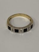 A HALLMARKED 9CT GOLD AND SAPPHIRE HALF ETERNITY RING SIZE Q, WEIGHT 3G
