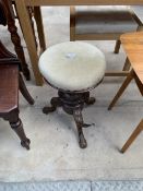 A VICTORIAN ADJUSTABLE PIANO STOOL
