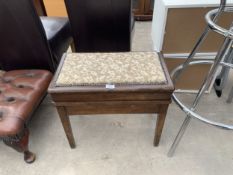 AN EDWARDIAN PIANO STOOL WITH LIFT UP SEAT