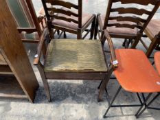 AN EDWARDIAN PIANO STOOL WITH LIFT UP SEAT
