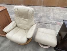 A STRESSLESS EKORNES SWIVEL RECLINER AND STOOL