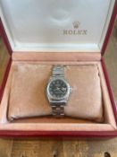 A LADIES' ROLEX DATEJUST WRISTWATCH, 26 MM, BLACK ROMAN DIAL OYSTER BRACELET, NICE CONDITION,