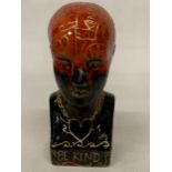 AN ANITA HARRIS PHRENOLOGY HEAD, SIGNED IN GOLD TO THE BASE