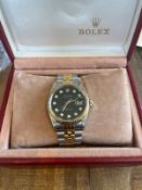 A GENTLEMAN'S ROLEX DATEJUST WRISTWATCH, 36 MM, BI-METAL JUBILEE BRACELET, BLACK DIAMOND DOT DIAL,