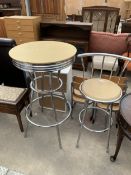 A BAR TABLE ON POLISHED CHROME TUBULAR BASE AND MATCHING STOOL