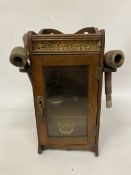 A VINTAGE MAHOGANY SMOKER'S CABINET WITH PIPES AND BRASS FRETWORK, HEIGHT 32CM