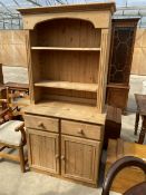 A PINE KITCHEN DRESSER WITH RACK, TWO DRAWERS AND TWO CUPBOARDS TO BASE, 39" WIDE
