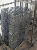 A STACK OF SHOPPING BASKETS