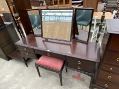A STAG MINSTREL DRESSING TABLE AND STOOL, 60" WIDE