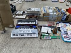 AN ASSORTMENT OF MUSIC ITEMS TO INCLUDE THREE KEYBOARDS, RECORDERS AND A MUSIC STAND ETC
