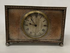 A SILVER PLATED MANTLE CLOCK