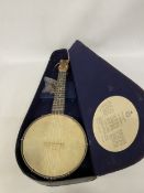 A VINTAGE JOHN GREY AND SONS BANJOLELE IN ORIGINAL CASE