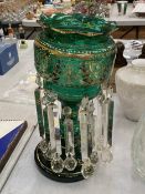 A VICTORIAN EMERALD GREEN GLASS MANTLE LUSTER WITH HAND-PAINTED GILT DECORATION WITH CLEAR CRYSTAL