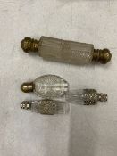 A VICTORIAN DOUBLE ENDED, HOBNAIL CUT, SCENT BOTTLE WITH GILT CAPS, PLUS THREE SMALLER SCENT