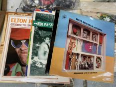 A COLLECTION OF VINYL LP RECORDS TO INCLUDE GENESIS, THE BEATLES, ELTON JOHN, CAPTAIN FANTASTIC,