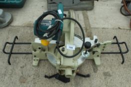 A MAKITA MITRE SAW IN WORKING ORDER NO VAT