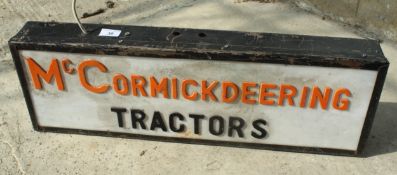 AN ILLUMINATED MCCORMICK-DEERING SIGN - NO VAT