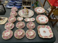 AN ANTIQUE 'SWANSEA ROSE' BY GROSVENOR, CHINA TEASET TO INCLUDE A CAKE STAND, TRIOS, LIDDED