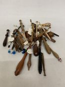 A LARGE COLLECTION OF LACE MAKING BOBBINS WITH VARIOUS TYPES OF WOODS
