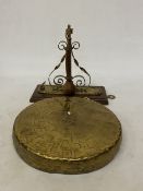 A VINTAGE BURMESE BRASS WALL HANGING GONG AND STRIKER