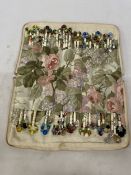 A COLLECTION OF APPROX 54 BONE LACE MAKING BOBBINS WITH DECORATION, CHARMS AND SPANGLES