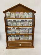 A BROOKES BENTLEY SPICE RACK COMPLETE WITH 24 CERAMIC SPICE JARS