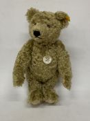 A REPLICA STEIFF 1920 CLASSIC TEDDY BEAR WITH GROWLER AND BUTTON IN HIS EAR