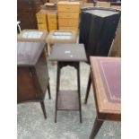 AN EDWARDIAN MAHOGANY TWO TIER JARDINIER STAND