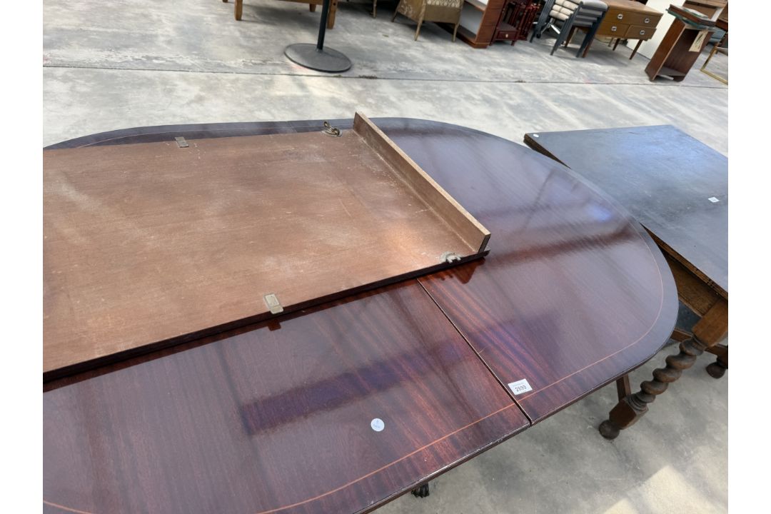 A REGENCY STYLE MAHOGANY TWIN PEDESTAL DINING TABLE 64" X 40" (LEAF 22") - Image 2 of 3