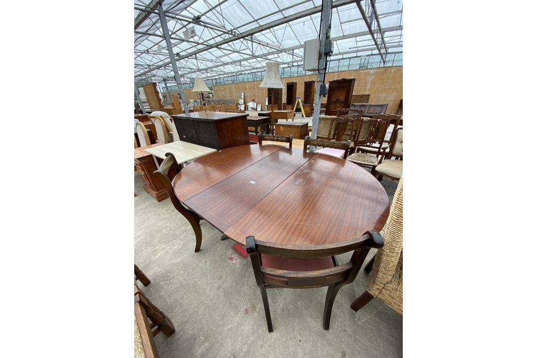 A REGENCY STYLE PEDESTAL DINING TABLE AND FOUR BRASS INLAID DINING CHAIRS - Image 1 of 6