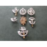 A WORLD WAR II UPPER THAMES PATROL HOME GUARD CAP BADGE, RIFLE BRIGADE AND LIGHT INFANTRY BADGES (