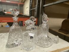FIVE CUT GLASS DECANTERS WITH STOPPERS TO INCLUDE ROYAL DOULTON, STUART CRYSTAL AND FURTHER STOPPER