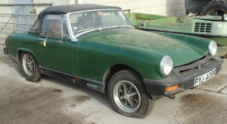 A GREEN MG MIDGET PVJ406R A BARN FIND WITH NO LOG BOOK NO VAT WHILST ALL DESCRIPTIONS ARE GIVEN IN
