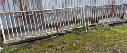 TWO SEVEN SECTION CALF FEEDING FENCES WITH 7 BUCKET HOLDERS (11FT EACH) NO VAT OFF SITE TO BE