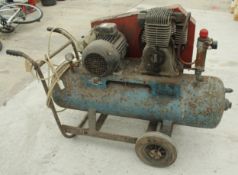 A COMPRESSOR IN WORKING ORDER + VAT