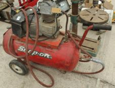 A SNAP ON AIR COMPRESSOR IN WORKING ORDER NO VAT