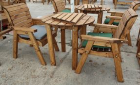 AN AS NEW EX DISPLAY CHARLES TAYLOR BISTRO TABLE AND TWO CHAIRS WITH CUSHIONS AND ARM REST TABLE *
