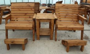 AN AS NEW EX DISPLAY CHARLES TAYLOR PAIR OF CHAIRS WITH A SIDE TABLE AND TWO FOOT RESTS + VAT