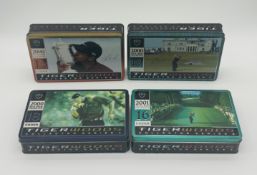 Four Tiger Woods Collectors Series Nike golf balls in presentation tins including 2000 US Open