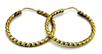 A pair of 9ct gold hoop earrings with barley twist detailing - weight 4.42g