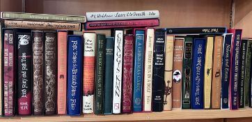 A large collection of mainly fiction Folio Society books including Treasure Island, A Christmas